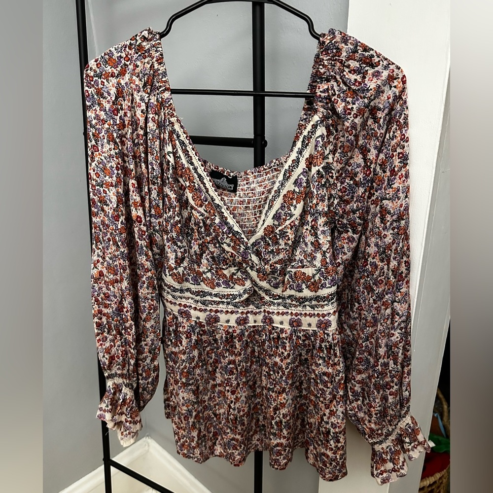 Angie Floral Ruffle Front Twist Long Sleeve Peplum Top Size L